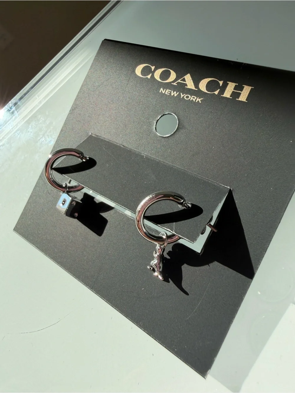 COACH Silver mini rexy and dice charm Hoop Earrings